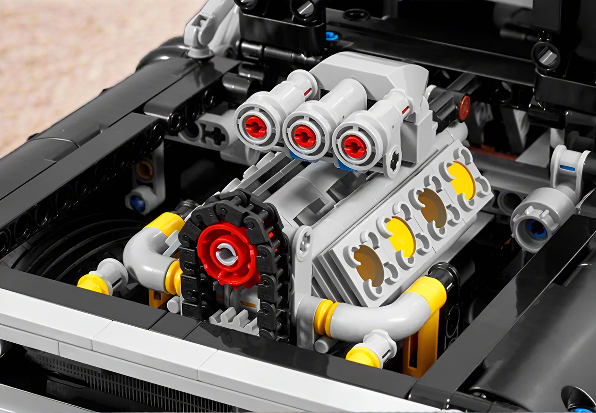 Close-up of a LEGO Dodge Charger 1970 engine model with detailed components on a wooden surface.